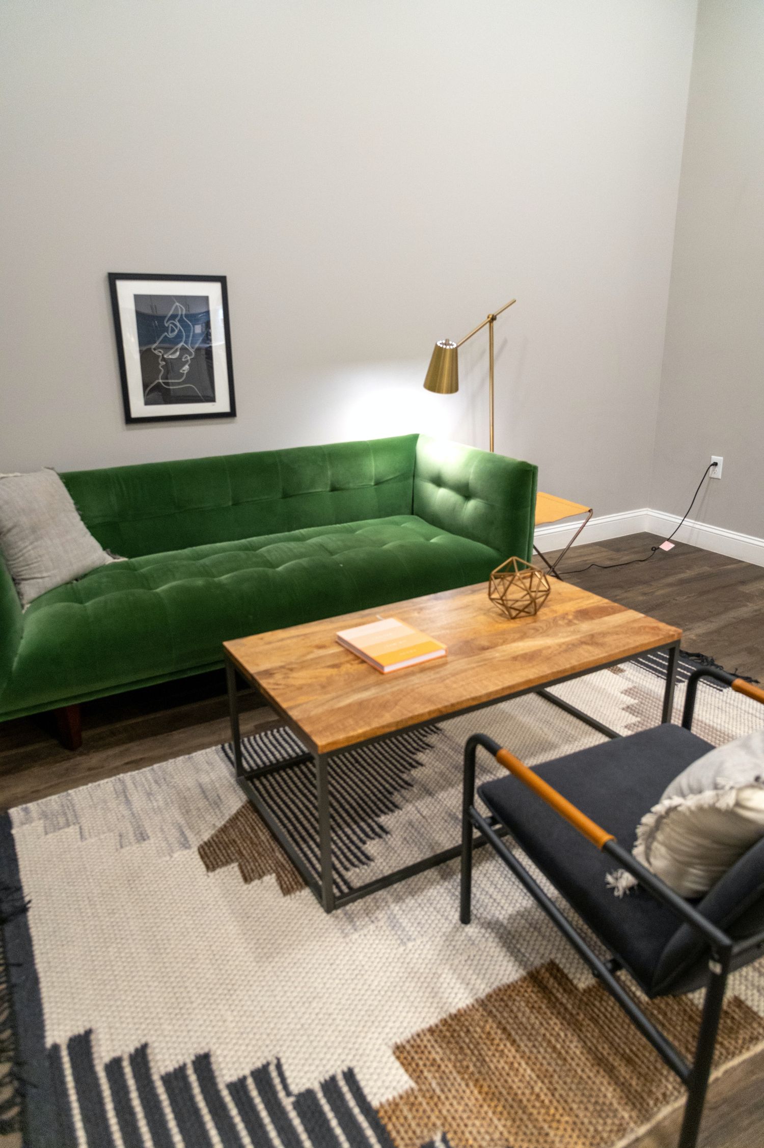 Rug beneath a sofa and coffee table