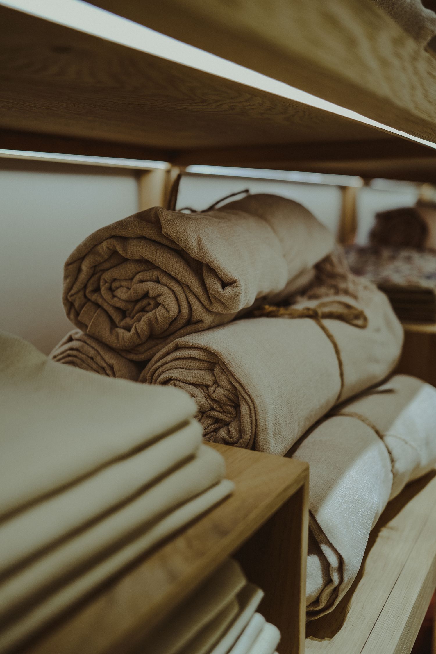 Folded towels on a shelf