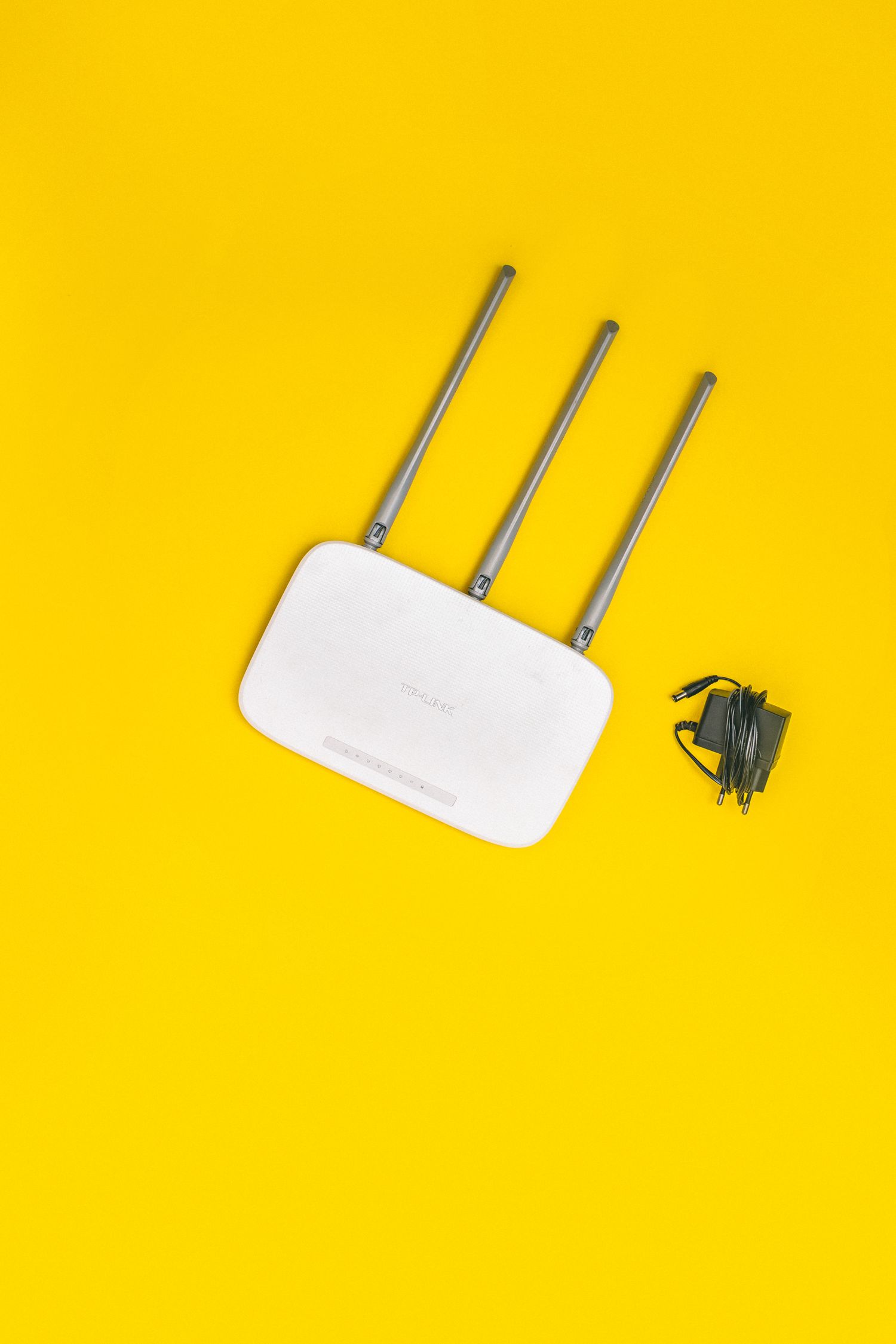 Wireless router against a yellow background