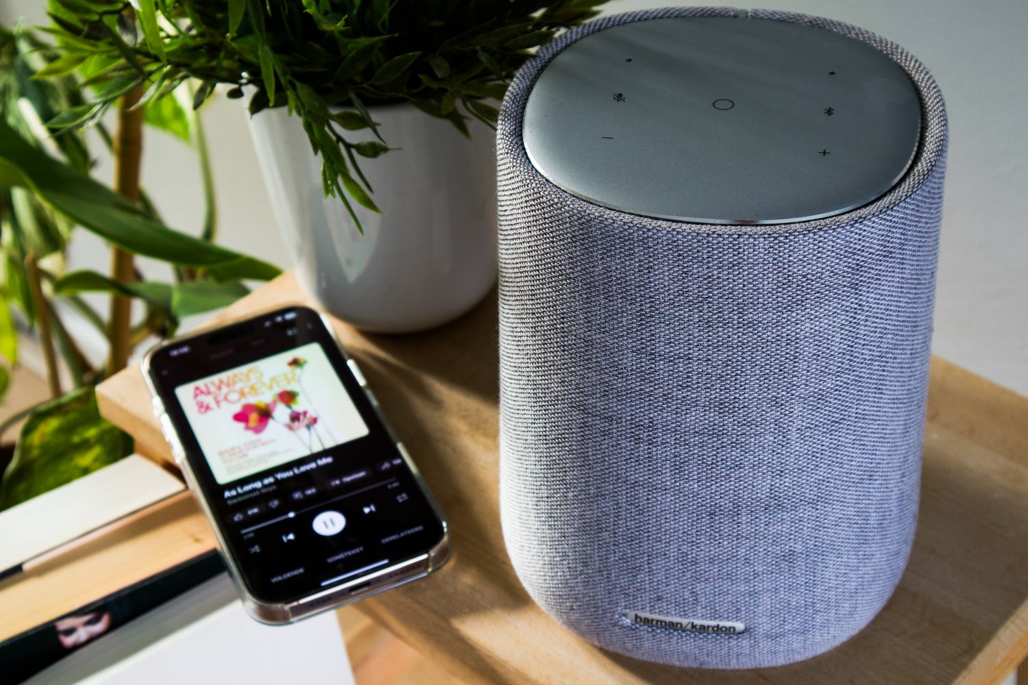 Bluetooth speaker next to a smartphone