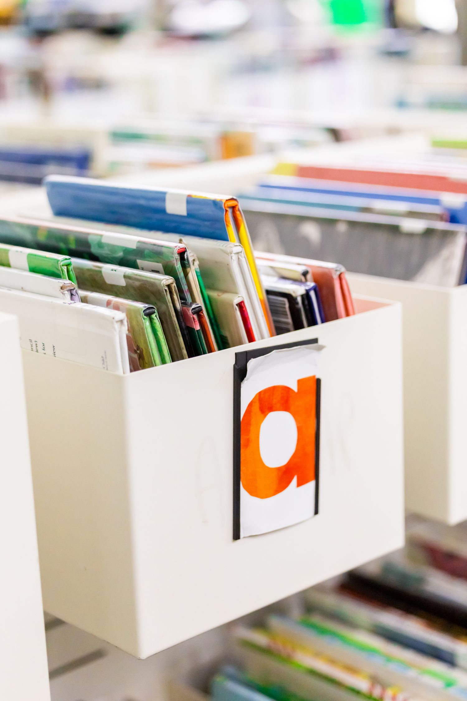 Open filing drawer with organized folders