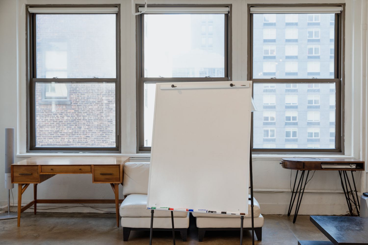 Freestanding whiteboard in a light office