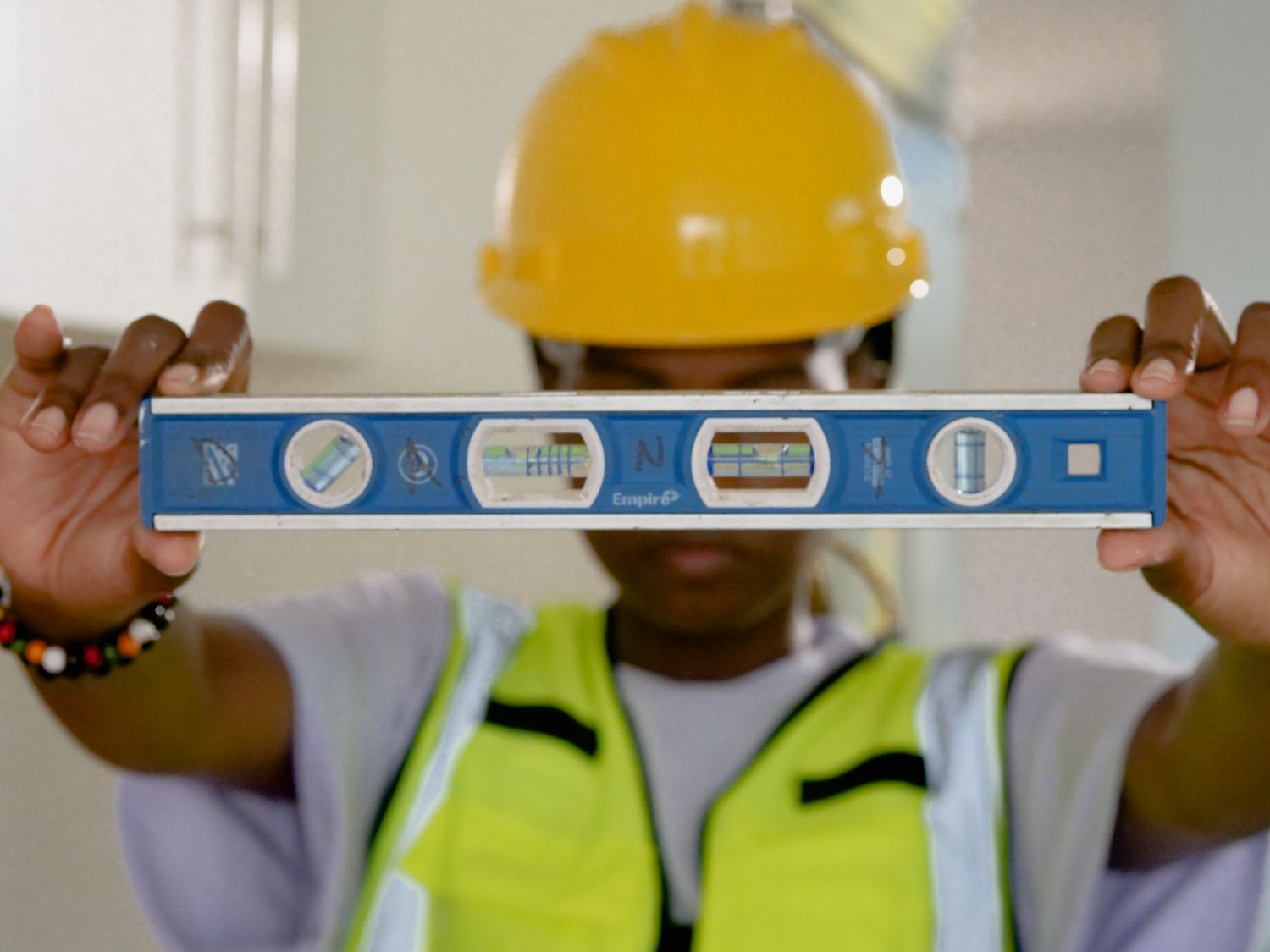 Person holding a spirit level